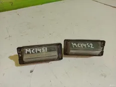 Фонарь подсветки номера Mitsubishi Lancer 9