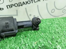 Форсунка омывателя фары левая Mercedes-Benz