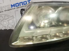 Фара левая Audi A6 4F2 C6 CAJ