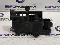 Блок клапанов пневмоподвески Land Rover рест.