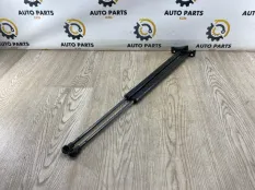 Амортизатор крышки багажника Mitsubishi Outlander