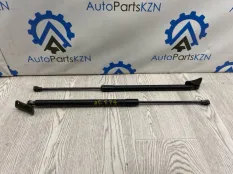 Амортизатор крышки багажника Mitsubishi Outlander