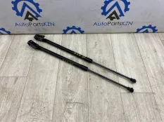 Амортизатор крышки багажника Mitsubishi Outlander