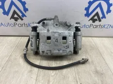 Суппорт тормозной Mitsubishi Outlander
