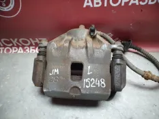 Суппорт тормозной Hyundai TUCSON 2004-2009 581102E000 JM, передний левый