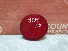 Катафот в бампер Nissan Qashqai 2010-2013 26561BR00A J10 РЕСТАЙЛИНГ, задний левый
