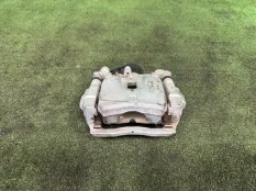 Суппорт Toyota Tundra 2021-2026 478500C040, задний левый