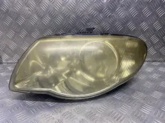 Фара левая Chrysler Voyager IV (2000-2007) 2005 04857831AB 2.8 D ENR