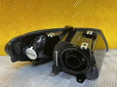 Фара левая Chrysler Voyager IV (2000-2007) 2004 04857701AC