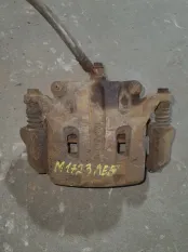 Суппорт передний левый Nissan Pathfinder (R51M) 2004-2013 2009 410115X00A ВНЕДОРОЖНИК 2.5 D YD25DDTI