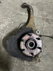 Кулак поворотный левый Nissan Navara (D40) 2004-2015 2007 40015EB000 ПИКАП 2.5 D YD25DDTI