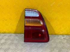 Фонарь крышки багажника левый Toyota Land Cruiser (100) 1998-2007 2000 8159060060 4.2 D 1HDFTE