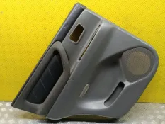 Обшивка двери задняя левая Toyota Land Cruiser (100) 1998-2007 2002 6764060530 4.7 I 2UZFE