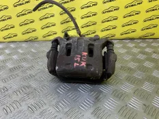 Суппорт передний левый Nissan Navara (D40) 2004-2015 2011 41011EB32A ПИКАП 2.5 D YD25DDTI