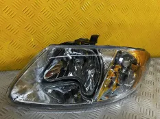 Фара левая Chrysler Voyager IV (2000-2007) 2004 04857701AC