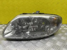 Фара левая Chrysler Voyager IV (2000-2007) 2004 04857711AB