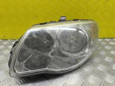 Фара левая Chrysler Voyager IV (2000-2007) 2004 04857832AB