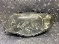 Фара левая Chrysler Voyager IV (2000-2007) 04857703AB