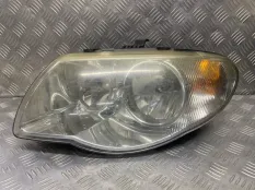 Фара левая Chrysler Voyager IV (2000-2007) 04857703AB