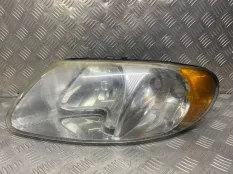 Фара левая Dodge Caravan IV (2000-2007) 04857701AB