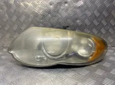 Фара левая Dodge Caravan IV (2000-2007) 04857991AC