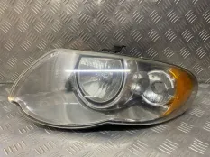 Фара левая Dodge Caravan IV (2000-2007) 04857831AB