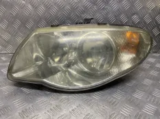 Фара левая Chrysler Voyager IV (2000-2007) 04857703AB