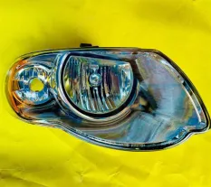 Фара правая Chrysler Voyager IV (2000-2007) 2004 04857990AD
