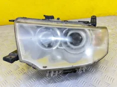 Фара левая Mitsubishi Pajero Sport II (2008-2017) 2012 8301B577 ВНЕДОРОЖНИК 2.5 D 4D56
