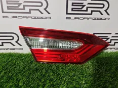 Фонарь крышки багажника левый Camry 70