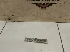 Эмблема Mazda 2 (DE)