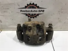Суппорт передний левый Mitsubishi Pajero/Montero