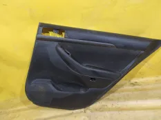 Обшивка двери Toyota Avensis 2
