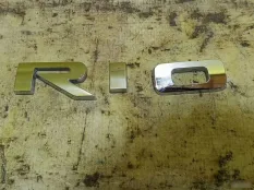 Эмблема крышки багажника Kia Rio