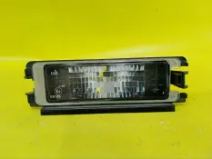 Фонарь подсветки номера renault Logan