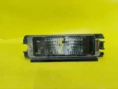 Фонарь подсветки номера renault Logan