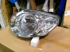Фара Kia Picanto 2008 9210107510, левая