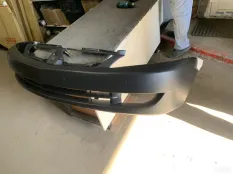 Бампер Mitsubishi Lancer 9 2006 6400B159, передний