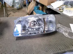Фара Hyundai Accent 9210125010, левая