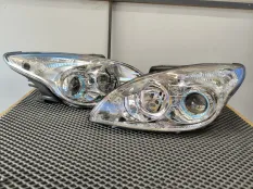 Фара Hyundai i30 2007 921012R000, левая