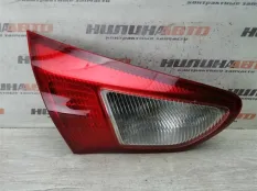 Фонарь в крышку багажника левый Mitsubishi Lancer