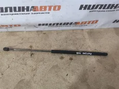 Амортизатор крышки багажника Mitsubishi Carisma