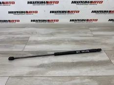Амортизатор крышки багажника Mitsubishi Carisma