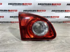 Фонарь Nissan Qashqai J10 левый в крышку багажника