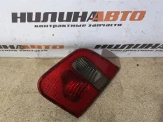 Фонарь правый Carisma крышки багажника MR485476