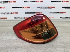 Фонарь левый Suzuki SX4 оригинал