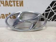 Эмблема Hyundai Santa Fe 2018-2020 86300S1100 4 TM ДО РЕСТАЙЛИНГ, передняя