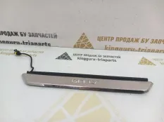 Накладка порога внутренняя Geely Tugella 2023 6600006647 FY11 РЕСТАЙЛИНГ JLH4G20TDB, передняя правая