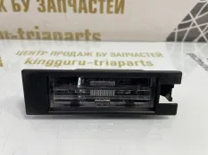 Плафон подсветки номера Opel Astra 2006-2014 OLSA0461200 H L69 СЕДАН РЕСТАЙЛИНГ, левый