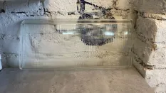 Стекло фары левое Volvo 760